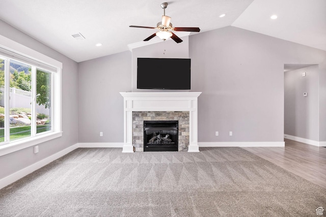 818 S 560 E, Providence, UT 84332 - unfurnished living room with lofted ceiling, ceiling fan, a glass covered fireplace, baseboards, and recessed lighting