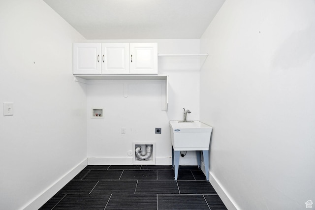 818 S 560 E, Providence, UT 84332 - laundry area with cabinet space, hookup for an electric dryer, washer hookup, and baseboards