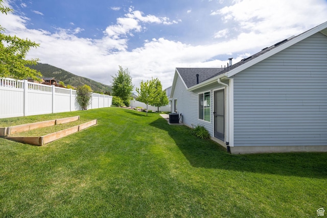 818 S 560 E, Providence, UT 84332 - view of yard featuring cooling unit, a mountain view, and a vegetable garden