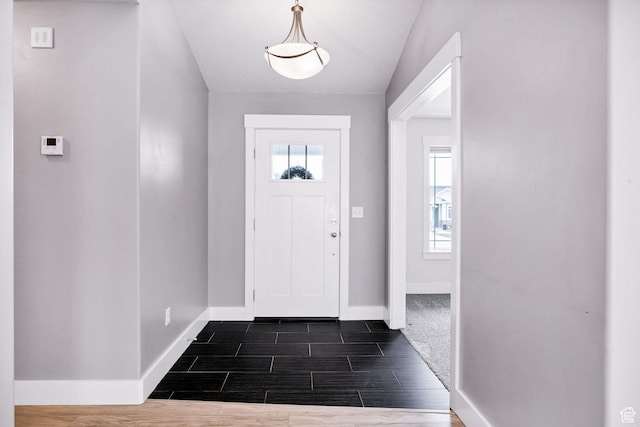 818 S 560 E, Providence, UT 84332 - entryway with baseboards and wood finish floors