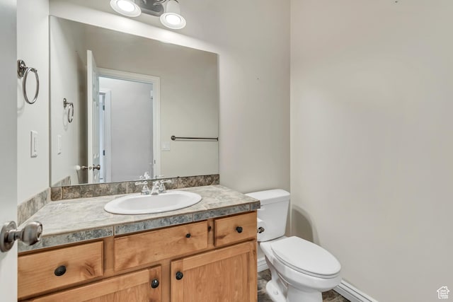 10972 S Crystal View Way S, Jordan, UT 84095 - bathroom featuring toilet, vanity, and baseboards