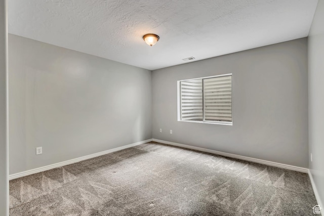10972 S Crystal View Way S, Jordan, UT 84095 - spare room featuring carpet, a textured ceiling, and baseboards