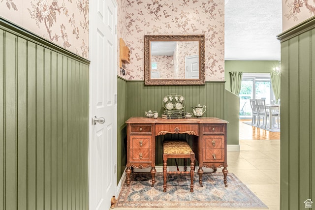 839 W Jordan Oaks Ct S, Sandy, UT 84070 - bathroom with a wainscoted wall, wallpapered walls, a textured ceiling, and tile patterned floors