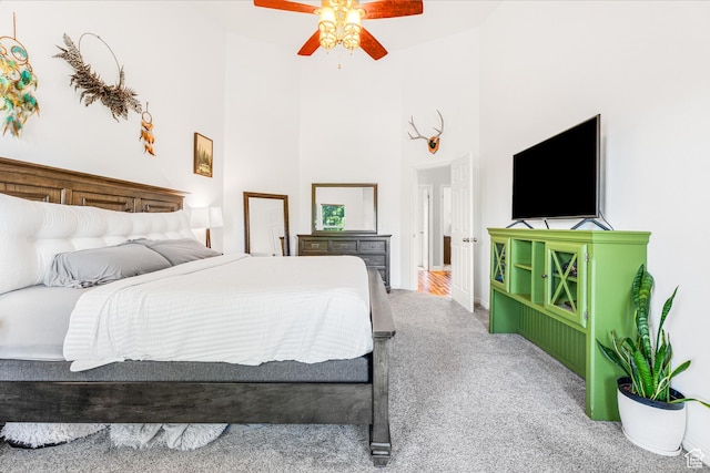 839 W Jordan Oaks Ct S, Sandy, UT 84070 - carpeted bedroom with high vaulted ceiling and a ceiling fan