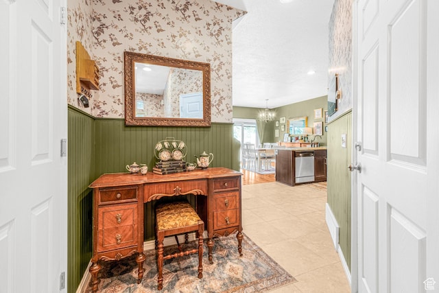 839 W Jordan Oaks Ct S, Sandy, UT 84070 - office area with wainscoting, a chandelier, wallpapered walls, light tile patterned flooring, and a textured ceiling