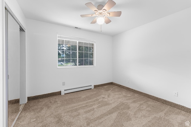 1173 N 350 W, Centerville, UT 84014 - unfurnished bedroom featuring baseboard heating, carpet, a closet, baseboards, and ceiling fan