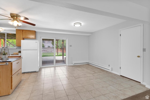 1173 N 350 W, Centerville, UT 84014 - kitchen featuring freestanding refrigerator, a ceiling fan, light tile patterned floors, dark countertops, and baseboard heating
