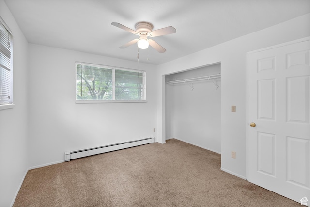 1173 N 350 W, Centerville, UT 84014 - unfurnished bedroom featuring baseboard heating, carpet floors, a closet, and baseboards