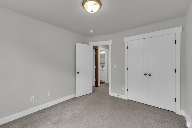 7185 N Hidden Steppe Bnd, Eagle Mountain, UT 84005 - unfurnished bedroom featuring carpet, baseboards, and a closet