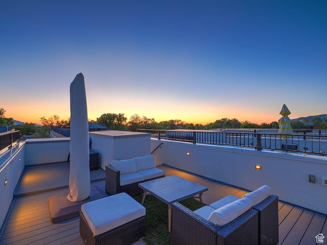 423 E 2100 S Unit 204, Salt Lake City, UT 84115 - deck at dusk with an outdoor living space