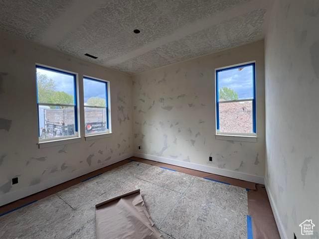 1409 Geer, Mccammon, ID 83250 - unfurnished room featuring a textured ceiling and baseboards