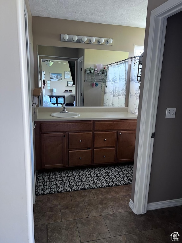 6466 W 8375 S, West Jordan, UT 84081 - bathroom featuring vanity and a textured ceiling