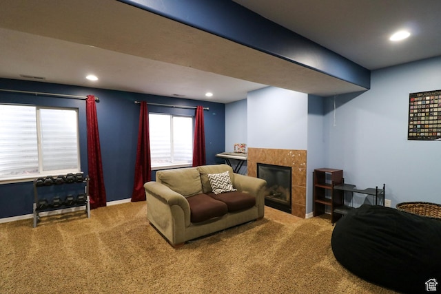 6466 W 8375 S, West Jordan, UT 84081 - carpeted living area featuring a tiled fireplace, recessed lighting, and baseboards