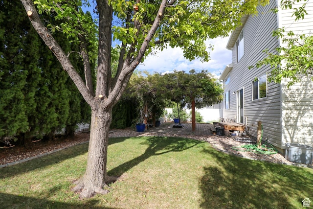 6466 W 8375 S, West Jordan, UT 84081 - view of green lawn featuring a patio