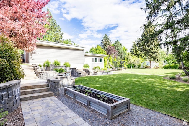 2262 E 1700 S, Salt Lake City, UT 84108 - view of grassy yard featuring a vegetable garden and stairway