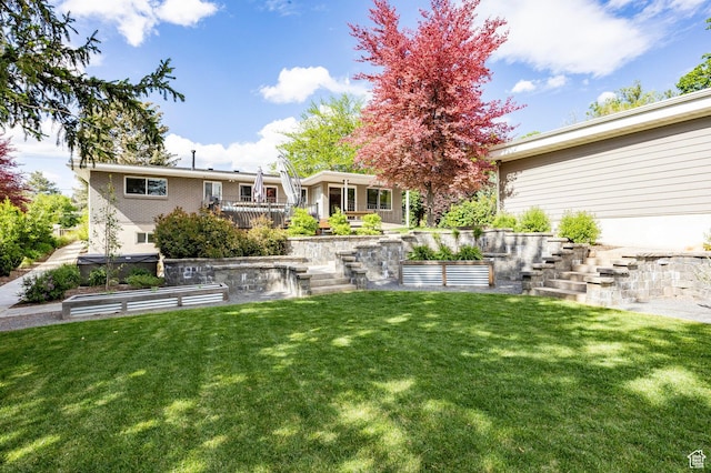 2262 E 1700 S, Salt Lake City, UT 84108 - view of green lawn with stairs and a wooden deck