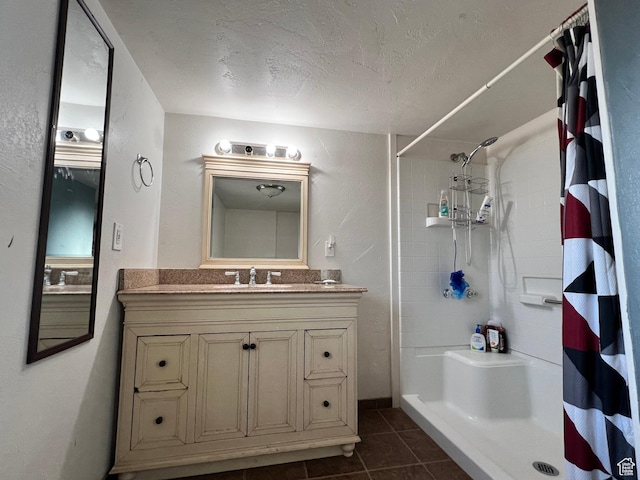 145 N 200 W, Roosevelt, UT 84066 - full bathroom with curtained shower, tile patterned flooring, vanity, and a textured ceiling