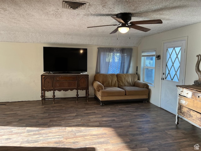 145 N 200 W, Roosevelt, UT 84066 - living room featuring a ceiling fan, wood finished floors, a textured ceiling, and lofted ceiling