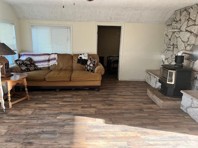 145 N 200 W, Roosevelt, UT 84066 - living room featuring a textured ceiling, wood finished floors, and a wood stove