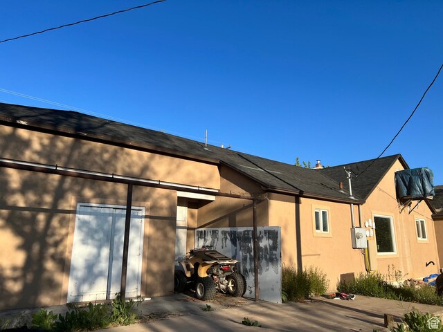 145 N 200 W, Roosevelt, UT 84066 - view of side of home featuring stucco siding