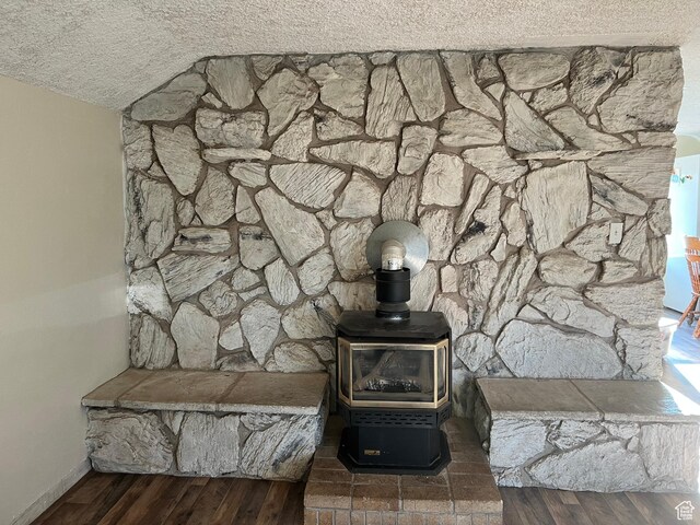 145 N 200 W, Roosevelt, UT 84066 - detailed view of a textured ceiling, wood finished floors, and a wood stove
