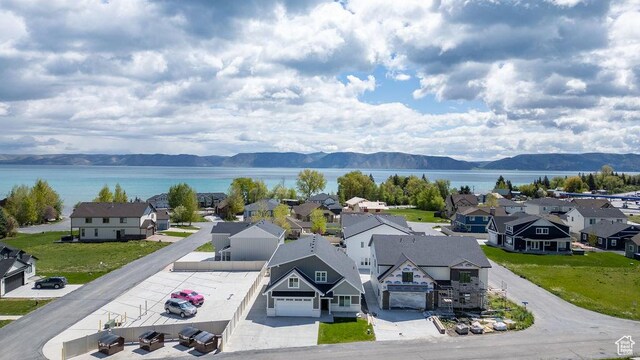 670 N Lake Sight Dr, Garden City, UT 84028 - aerial perspective of suburban area featuring a water and mountain view