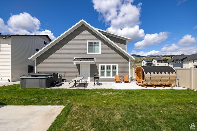 670 N Lake Sight Dr, Garden City, UT 84028 - back of house with a hot tub and a patio