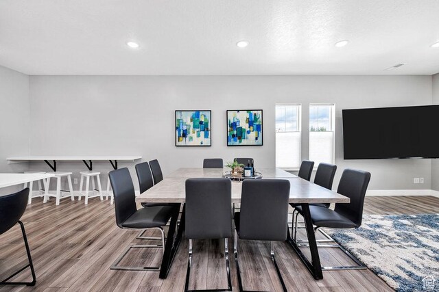 670 N Lake Sight Dr, Garden City, UT 84028 - dining area featuring wood finished floors, recessed lighting, and baseboards