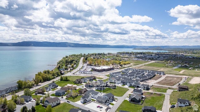 670 N Lake Sight Dr, Garden City, UT 84028 - aerial perspective of suburban area featuring a water and mountain view