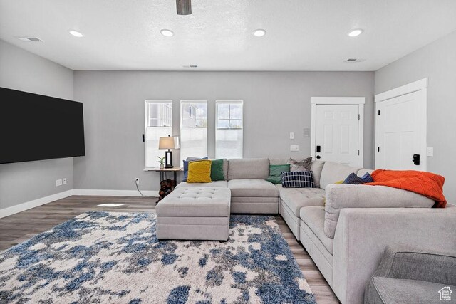670 N Lake Sight Dr, Garden City, UT 84028 - living area featuring wood finished floors, recessed lighting, and baseboards