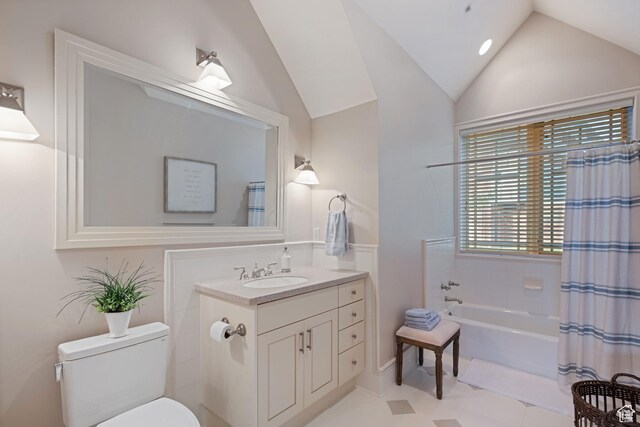 281 N Almond St W, Salt Lake City, UT 84103 - full bathroom with vaulted ceiling, toilet, vanity, shower / tub combo, and tile patterned flooring