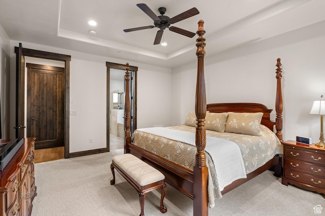 1765 E Kings Peak Cir Unit Cp-21, Heber City, UT 84032 - bedroom featuring light carpet, a tray ceiling, baseboards, ensuite bath, and recessed lighting