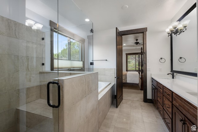 1765 E Kings Peak Cir Unit Cp-21, Heber City, UT 84032 - bathroom featuring a stall shower, double vanity, ceiling fan, ensuite bath, and tiled tub