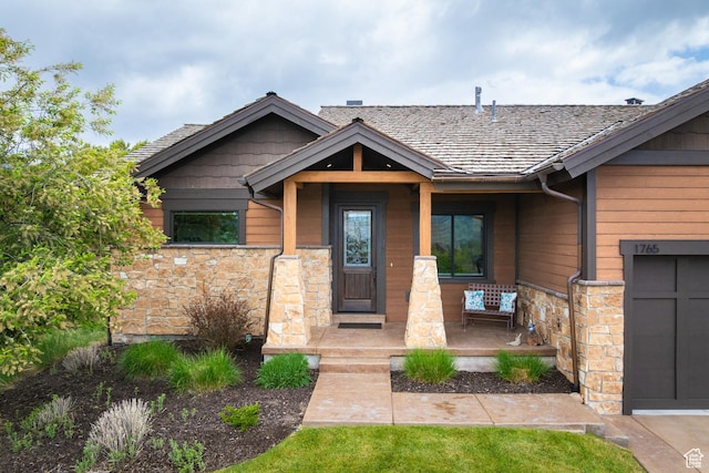 1765 E Kings Peak Cir Unit Cp-21, Heber City, UT 84032 - view of exterior entry featuring stone siding and a porch