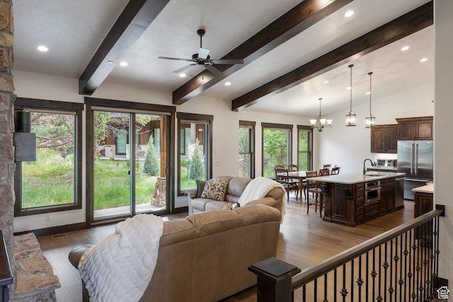 1765 E Kings Peak Cir Unit Cp-21, Heber City, UT 84032 - living area featuring wood finished floors, recessed lighting, ceiling fan, and a chandelier