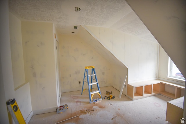 76 W 200 S, Hyde Park, UT 84318 - additional living space with a textured ceiling and vaulted ceiling