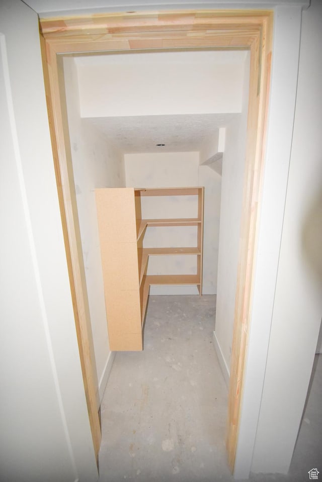 76 W 200 S, Hyde Park, UT 84318 - hall featuring concrete flooring and baseboards
