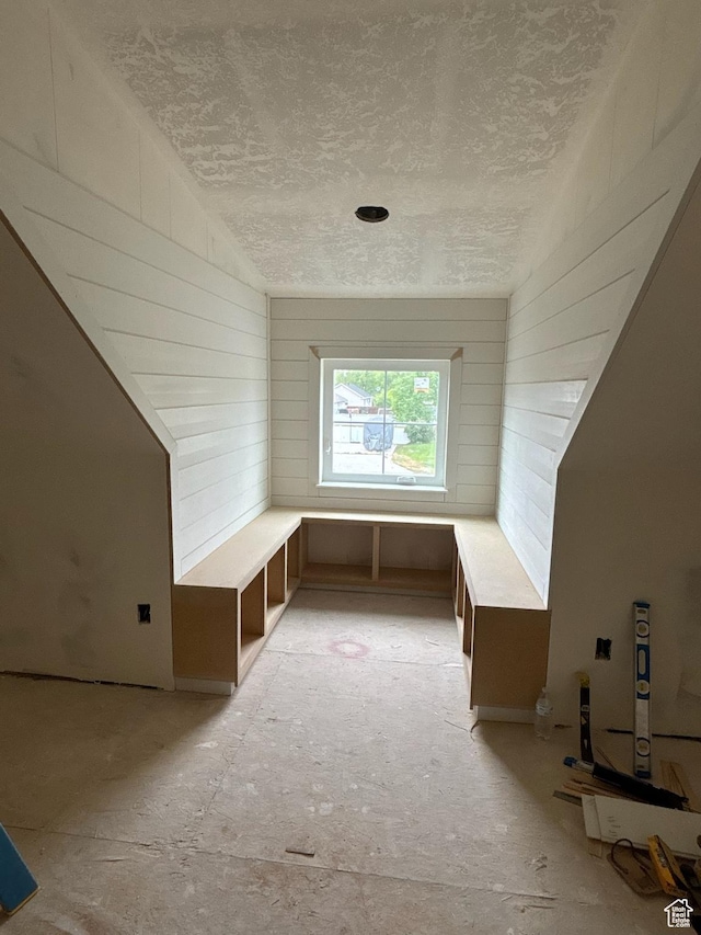 76 W 200 S, Hyde Park, UT 84318 - additional living space with a textured ceiling and wood walls