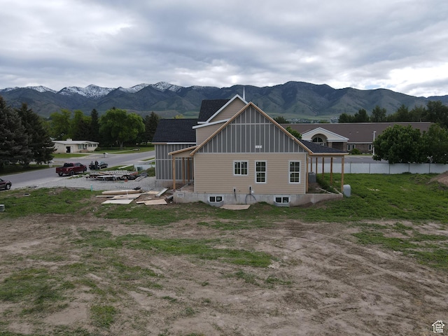 76 W 200 S, Hyde Park, UT 84318 - view of side of home featuring board and batten siding and a mountain view