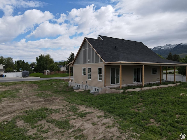 76 W 200 S, Hyde Park, UT 84318 - back of house with board and batten siding and a mountain view