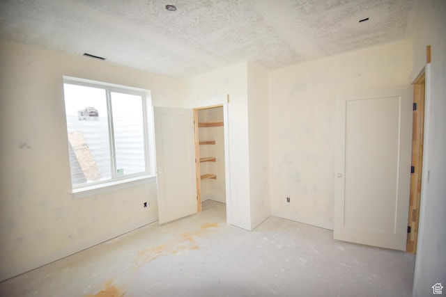 76 W 200 S, Hyde Park, UT 84318 - unfurnished bedroom featuring a textured ceiling