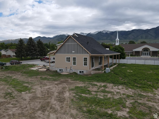 76 W 200 S, Hyde Park, UT 84318 - rear view of house featuring board and batten siding and a mountain view