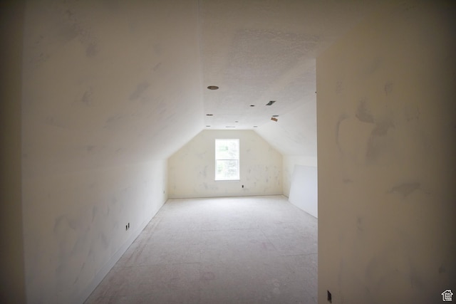 76 W 200 S, Hyde Park, UT 84318 - additional living space featuring vaulted ceiling and a textured ceiling