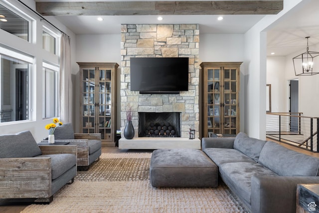 13200 N Alexis Dr, Heber City, UT 84032 - living area with a chandelier, beamed ceiling, and a fireplace