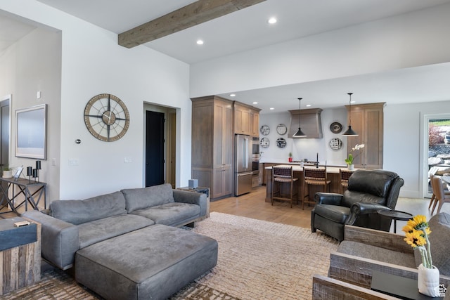 13200 N Alexis Dr, Heber City, UT 84032 - living area with light wood finished floors, recessed lighting, and beamed ceiling