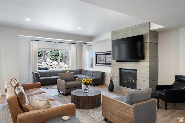 13200 N Alexis Dr, Heber City, UT 84032 - living area with wood finished floors, a fireplace, and recessed lighting