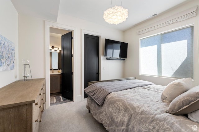 13200 N Alexis Dr, Heber City, UT 84032 - bedroom with light colored carpet and a chandelier