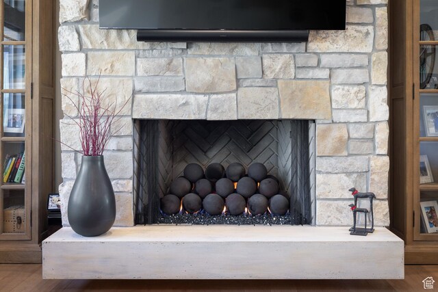 13200 N Alexis Dr, Heber City, UT 84032 - detailed view of a stone fireplace and wood finished floors