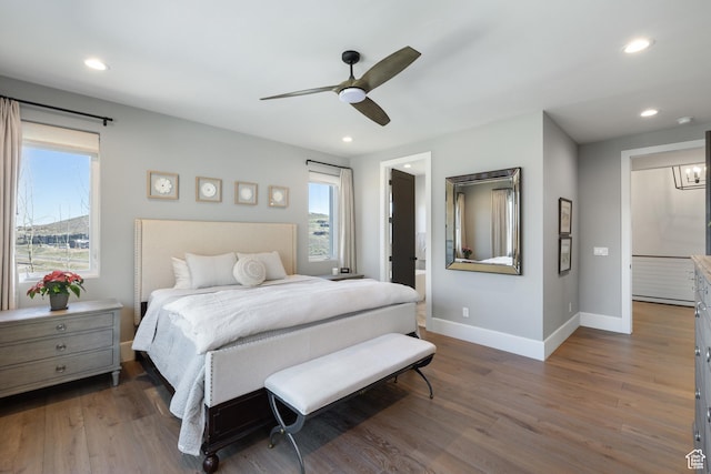 13200 N Alexis Dr, Heber City, UT 84032 - bedroom with baseboards, wood finished floors, recessed lighting, and a ceiling fan