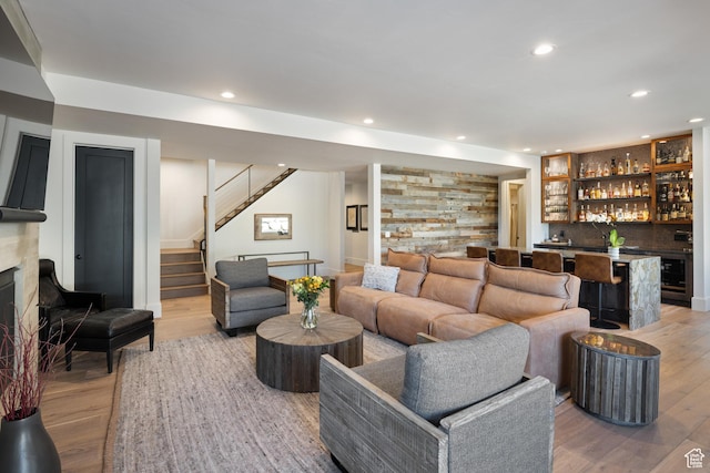 13200 N Alexis Dr, Heber City, UT 84032 - living area with wet bar, stairway, light wood finished floors, recessed lighting, and a fireplace